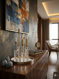5-arm crystal bubble candelabra set with brass stems displayed on a decorative tray on a wooden console