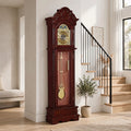 Mahogany grandfather clock with moon phase dial and gold pendulum displayed in a modern home entryway