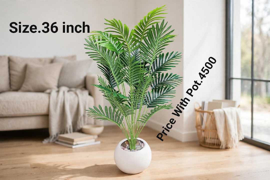 36 inch Artificial Areca Palm Plant with white ceramic pot in a living room setting