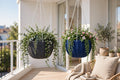 Rattan style hanging basket pots on a balcony with trailing plants