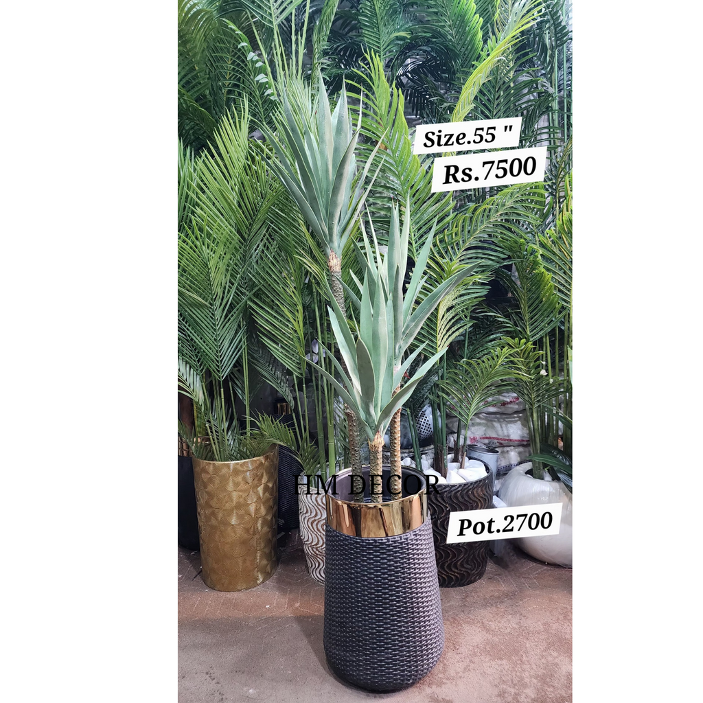 Artificial Yucca Plant styled in modern living room with black gold planter