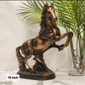 Bronze rearing horse figurine 15 inch antique finish on marble surface