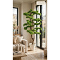 Artificial Topiary Bonsai Tree 52 inch in white pot styled in a bright living room corner
