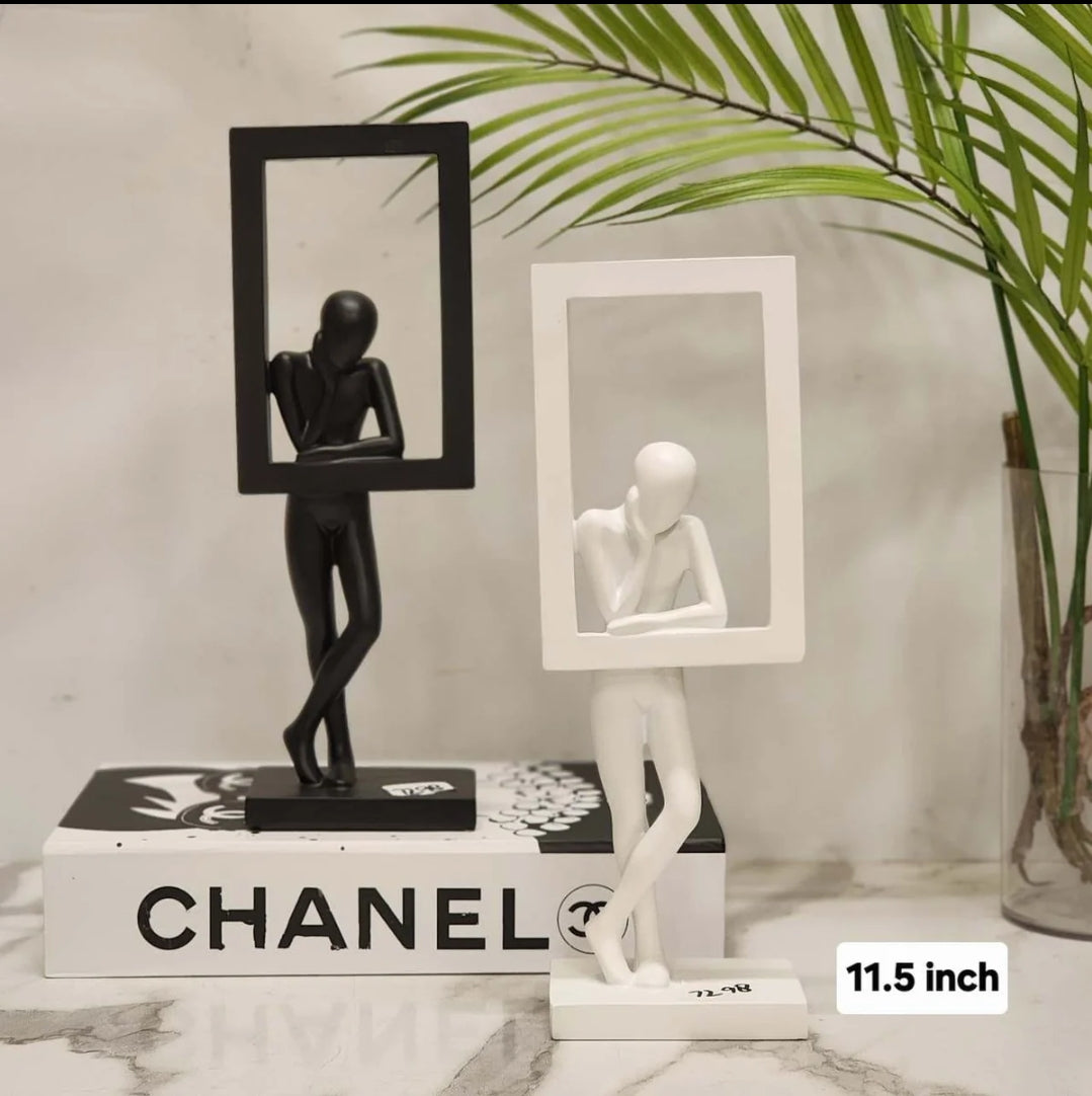 Abstract human figure with frame sculpture in matte black and white, 11.5 inch