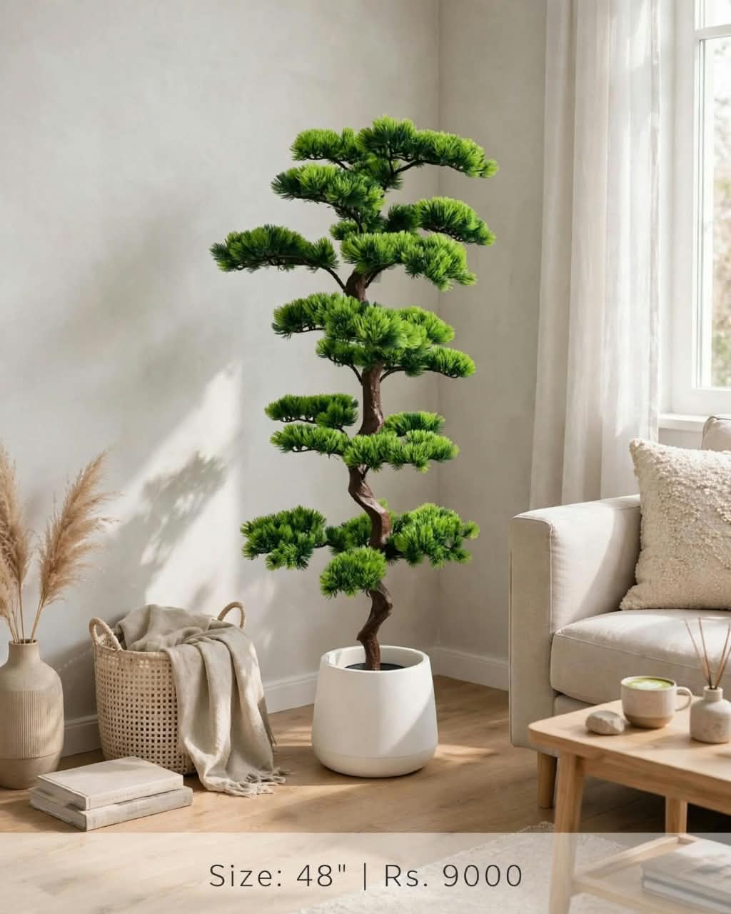 48 inch artificial bonsai tree in white planter in a modern living room