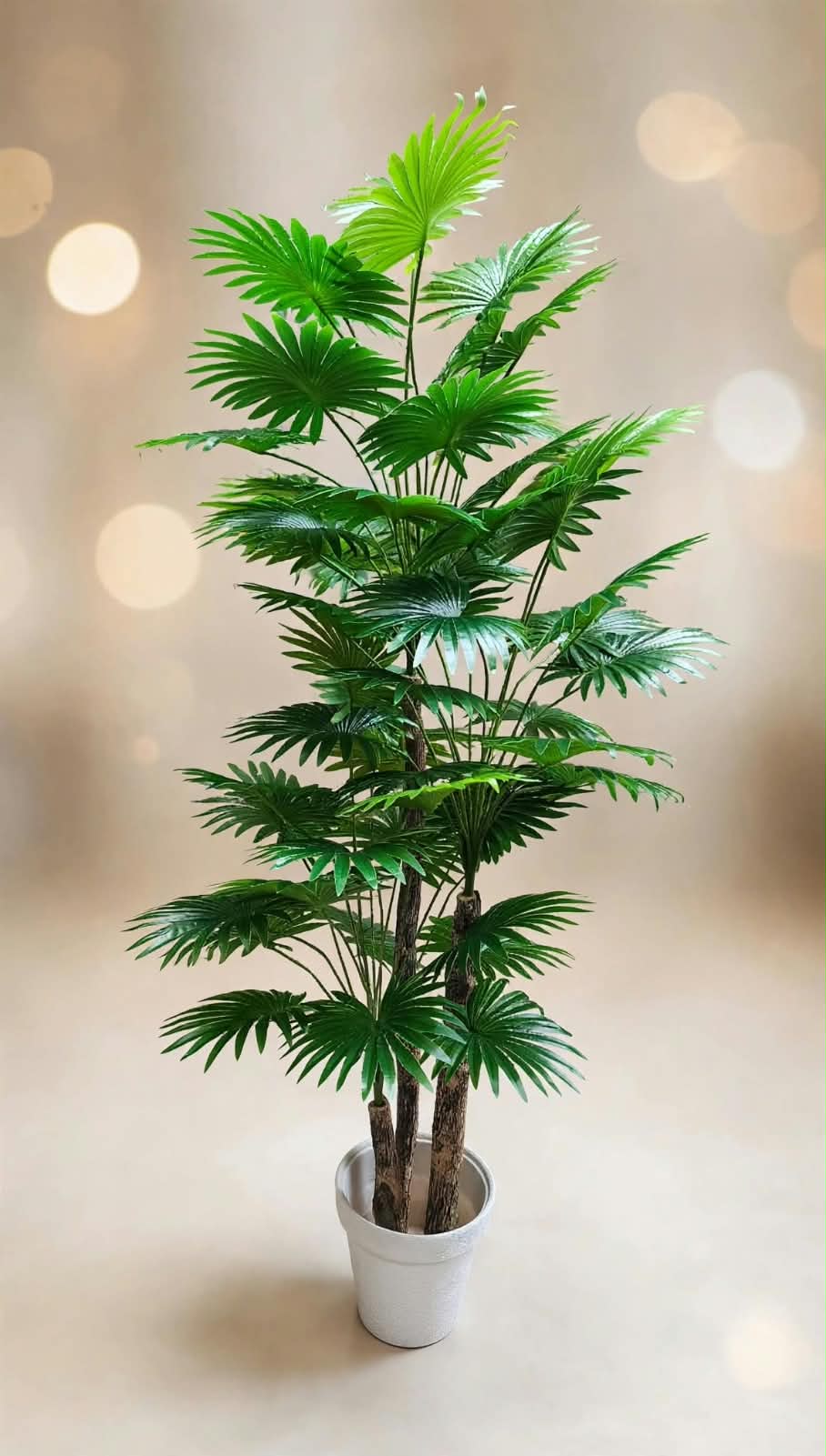 60-inch palm-style green plant shown in a white pot