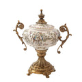 Porcelain lidded urn with bird print and brass handles