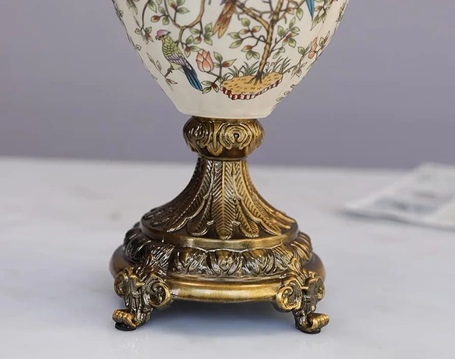 Ornate antique brass footed base of European porcelain vase