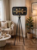 Industrial Gears Tripod Floor Clock in black and gold, 55 inches tall with 18 inch wide clock face, displayed in a luxury living room